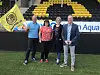 Det er (f.v.) Jarle Solemdal (Salten Aqua), Mona Mostli (Kobberløpet), Jannike Ramsvik (Bodø/Glimt) og Geir Wenberg (Salten Aqua) Foto: Bodø Glimt/Salten Aqua